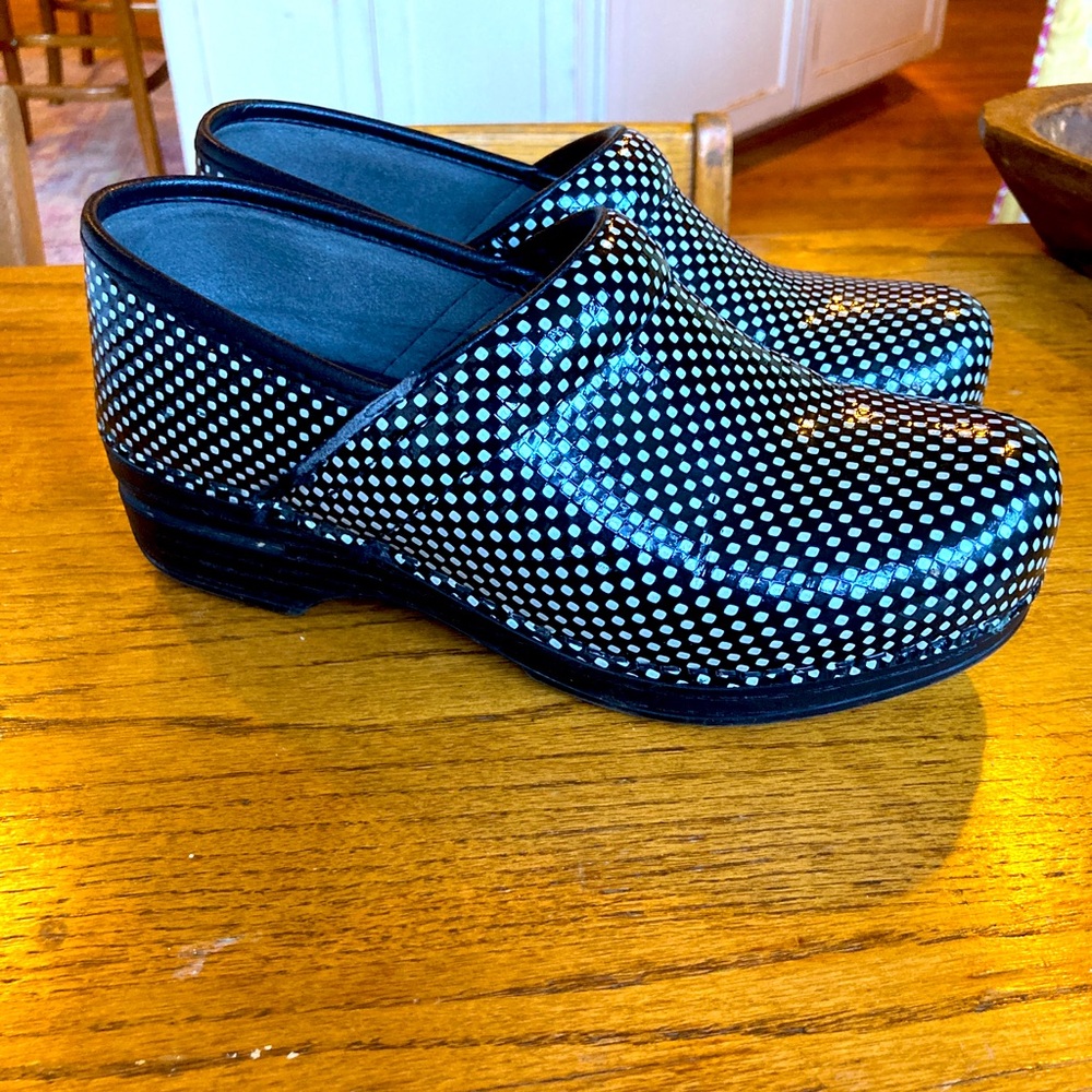 Black and white Dansko clogs. Barely worn!  Size 37.